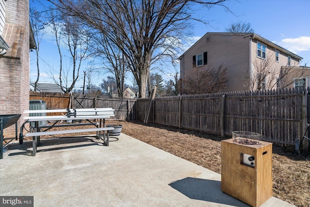 view of patio with cooling unit and a fenced backyard