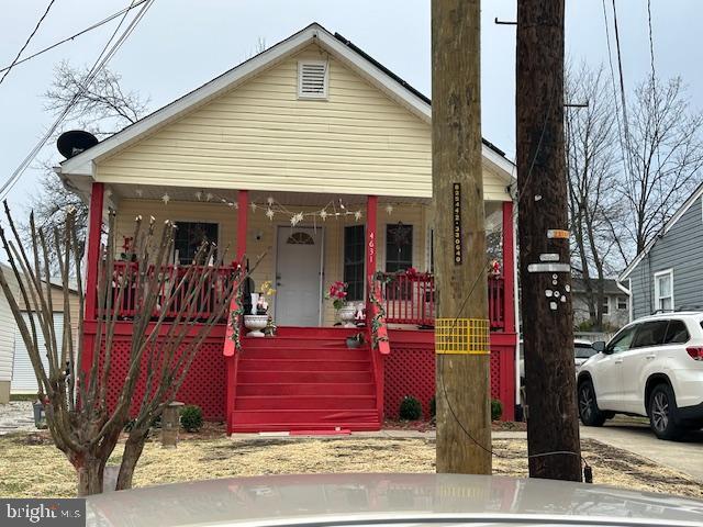 bungalow-style home with a porch