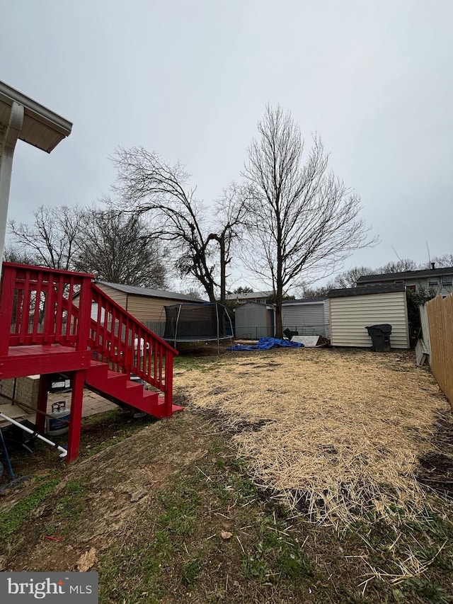 view of yard featuring a trampoline