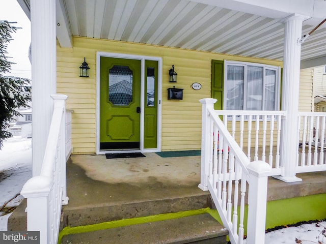 property entrance with a porch