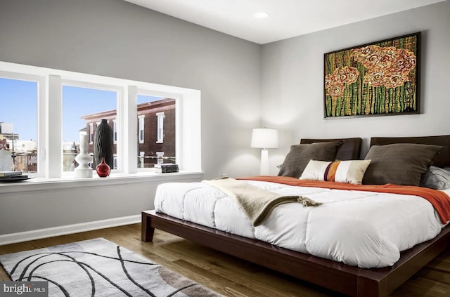 bedroom featuring wood-type flooring