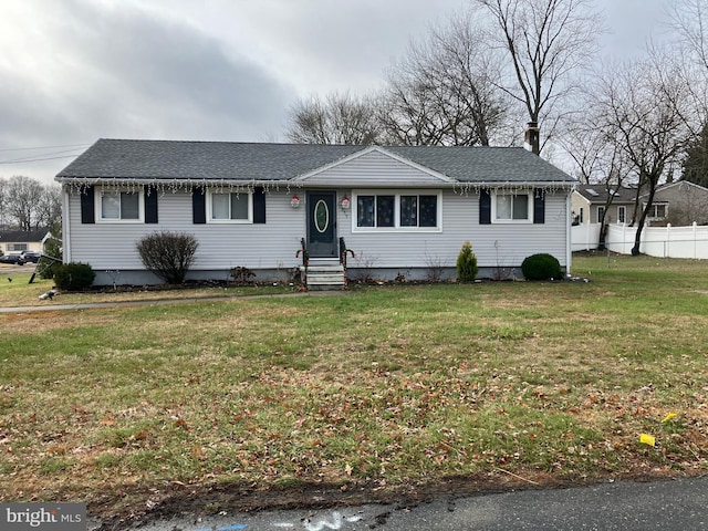 single story home featuring a front yard