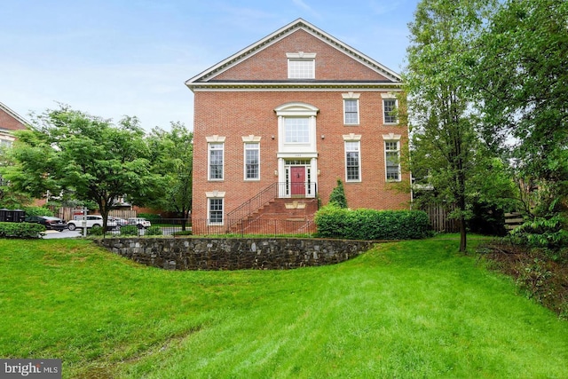 view of front of property with a front yard