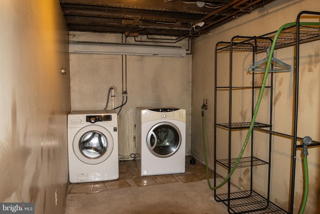 washroom with washer and clothes dryer