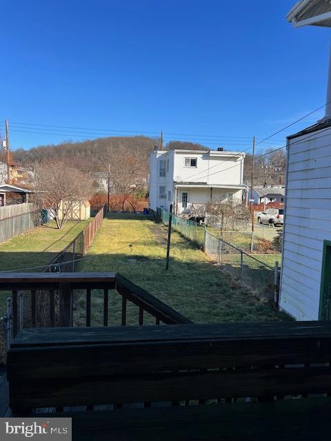 view of yard with a wooden deck