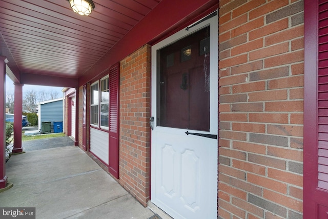 doorway to property featuring a porch