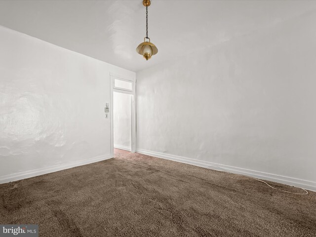 unfurnished room with carpet floors