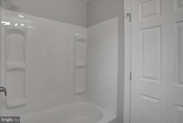 bathroom with shower / tub combination