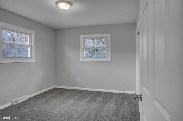 view of carpeted spare room