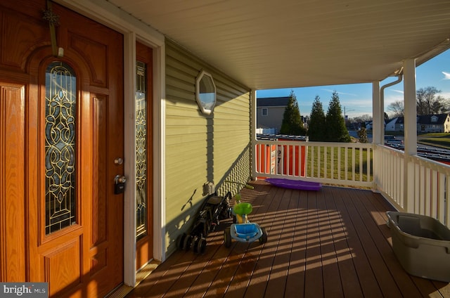 wooden deck with covered porch