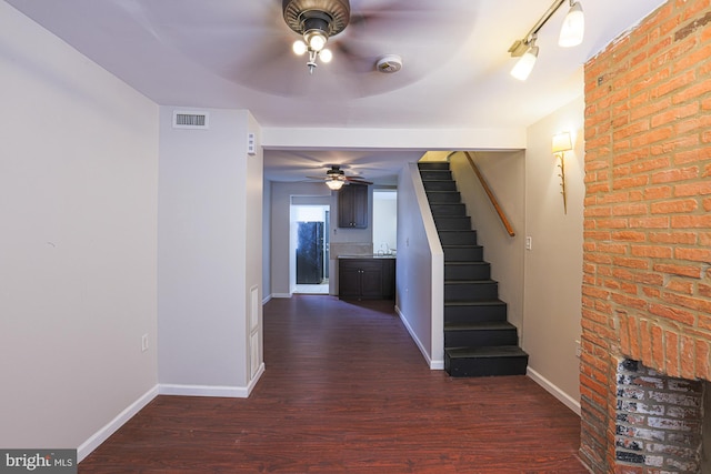 hall with dark hardwood / wood-style floors