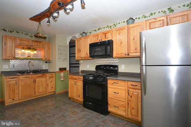 kitchen with sink and black appliances