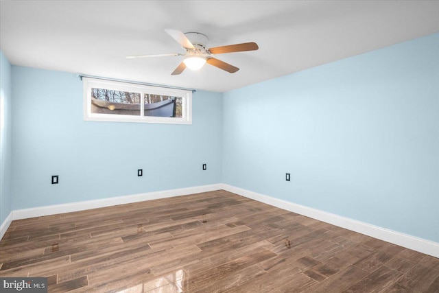 unfurnished room with hardwood / wood-style floors and ceiling fan