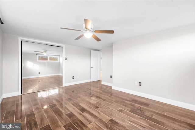 unfurnished room with hardwood / wood-style floors