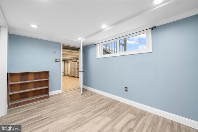 unfurnished bedroom featuring light wood-type flooring