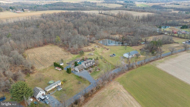 birds eye view of property featuring a rural view