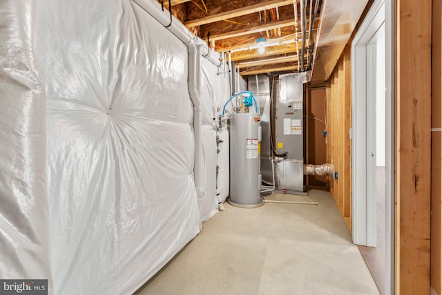 basement with electric water heater and heating unit