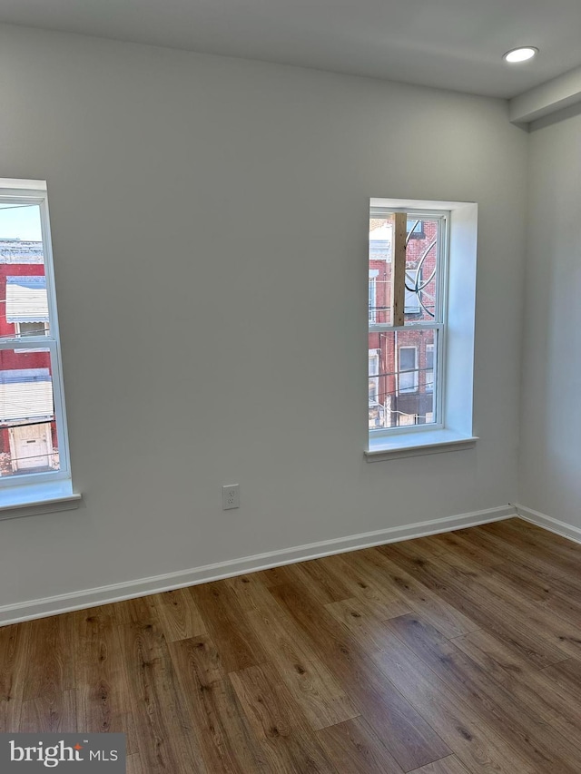 2215 N 10th St, Philadelphia, PA 19133 - empty room with wood finished floors and plenty of natural light