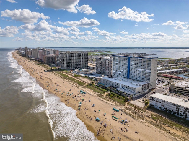 drone / aerial view with a view of the beach and a water view