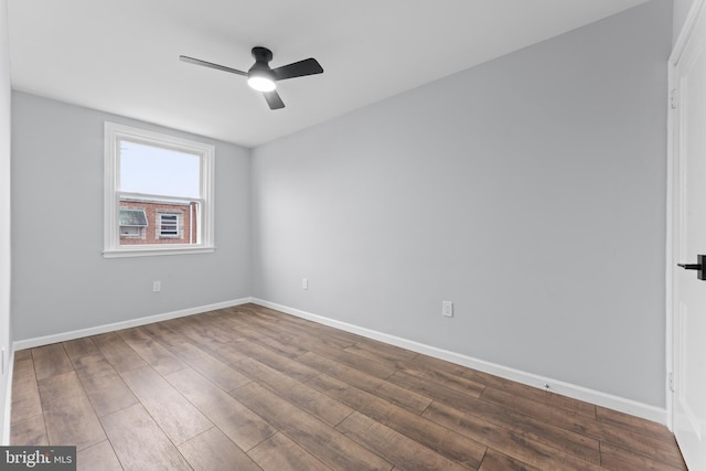 unfurnished room featuring ceiling fan and hardwood / wood-style floors