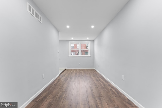 empty room featuring dark hardwood / wood-style floors