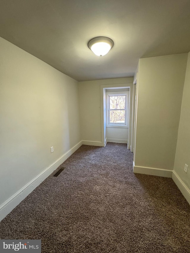 view of carpeted spare room