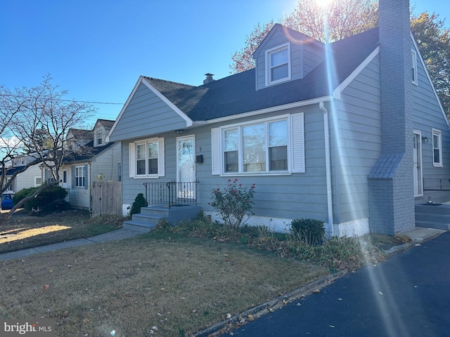 view of front of home with a front yard