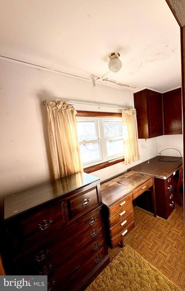 kitchen featuring parquet flooring