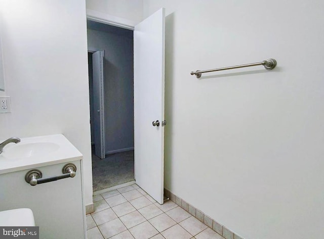 bathroom with tile patterned floors and sink