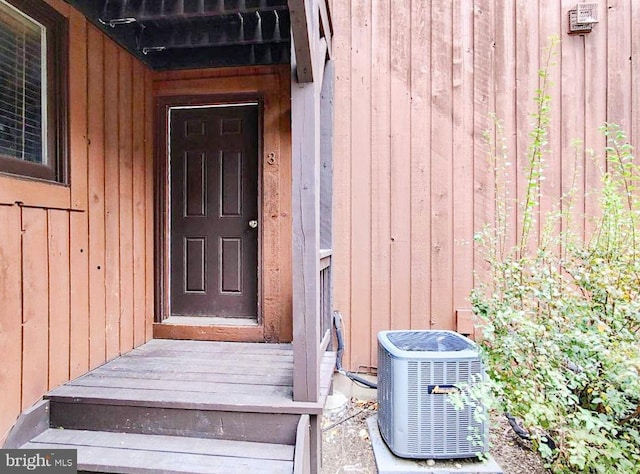 entrance to property with cooling unit