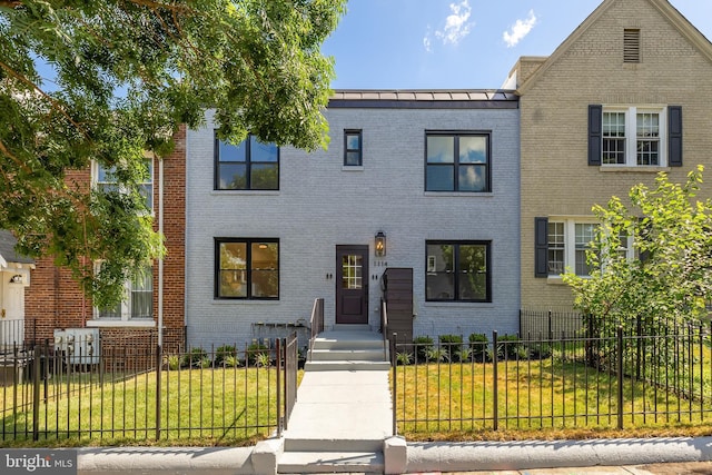 view of front of house with a front yard