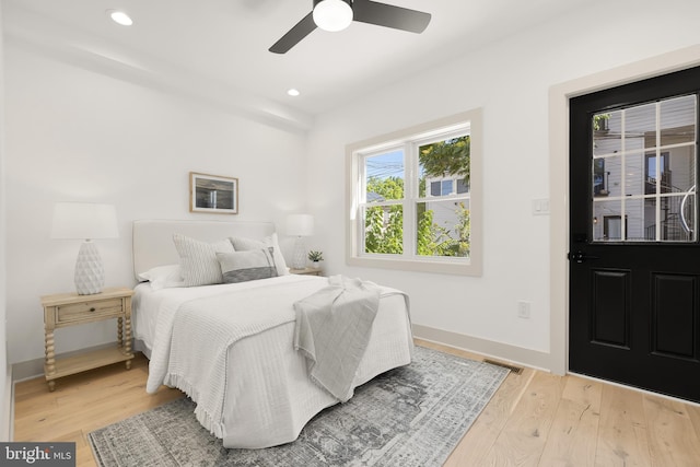 bedroom featuring ceiling fan and hardwood / wood-style floors