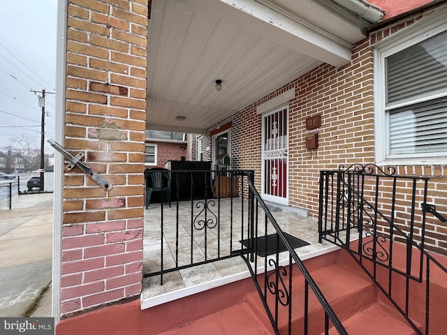 view of patio featuring a porch