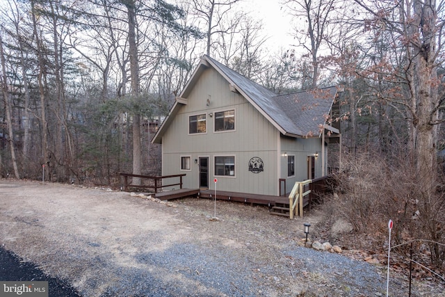 view of front facade featuring a wooden deck