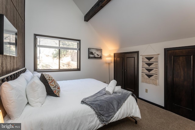 carpeted bedroom featuring beam ceiling and high vaulted ceiling