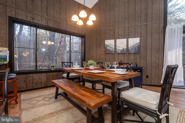 dining space featuring a notable chandelier and plenty of natural light