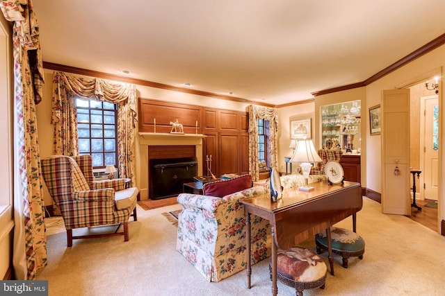 carpeted living room featuring ornamental molding