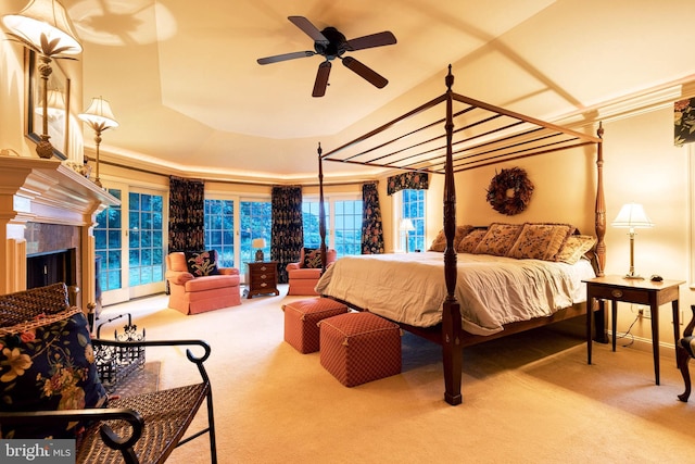 carpeted bedroom with ceiling fan and crown molding