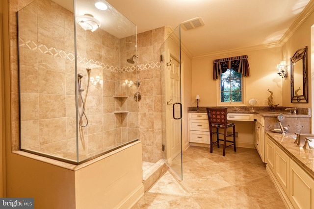 bathroom featuring vanity, a shower with door, and ornamental molding