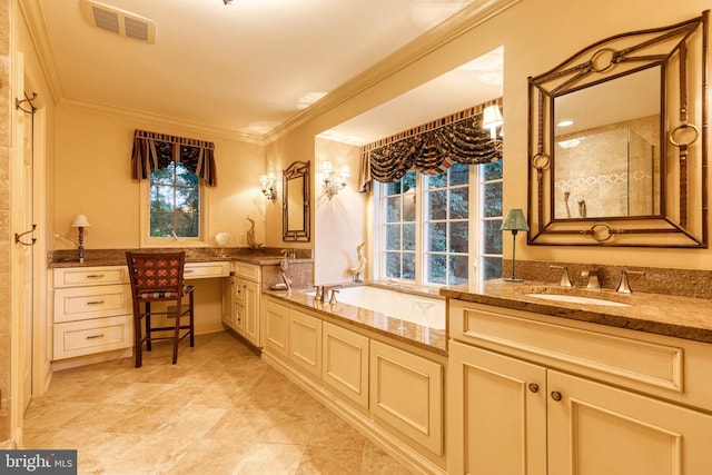 bathroom with a washtub, vanity, and ornamental molding