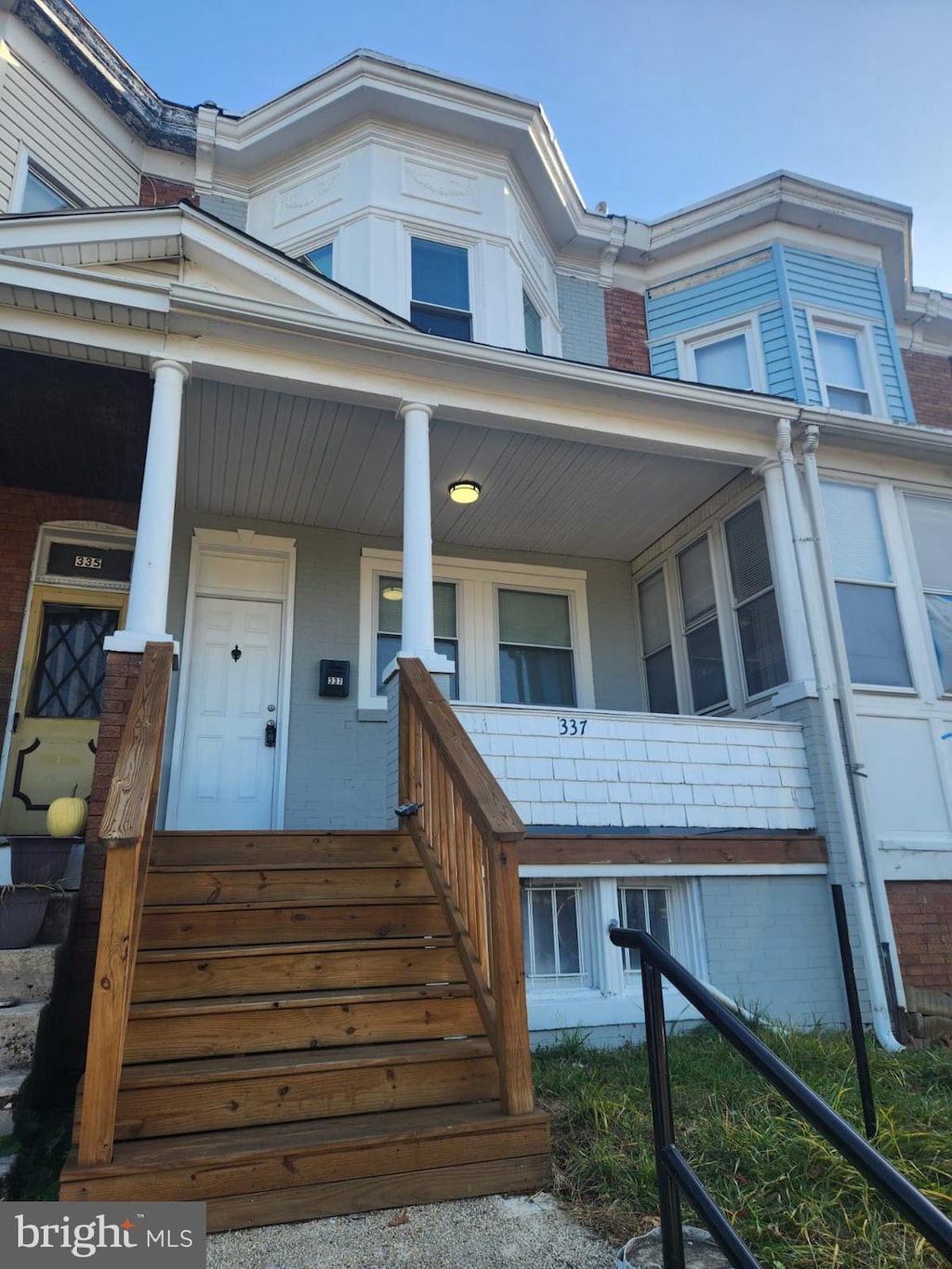 view of exterior entry featuring a porch