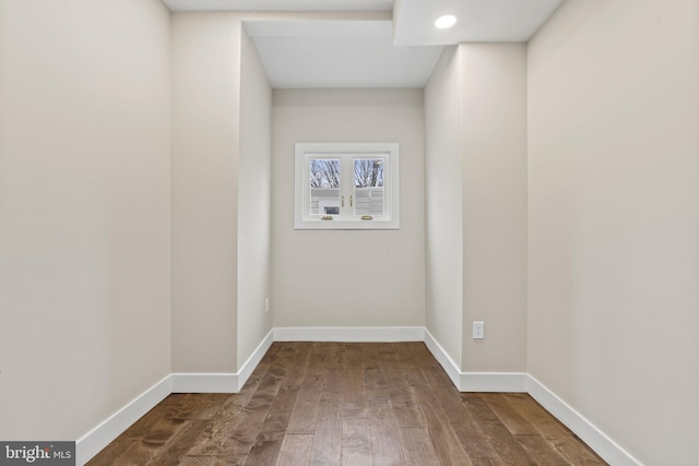 laundry room with hardwood / wood-style flooring