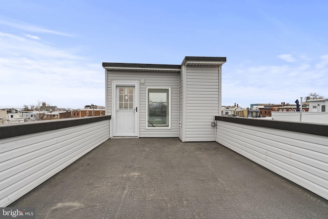 view of patio featuring a balcony