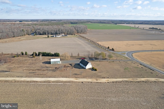 birds eye view of property with a rural view