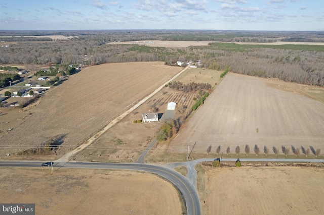 birds eye view of property featuring a rural view