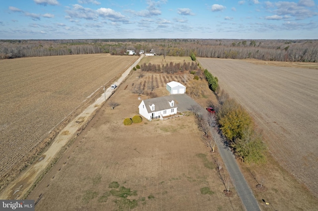 birds eye view of property featuring a rural view