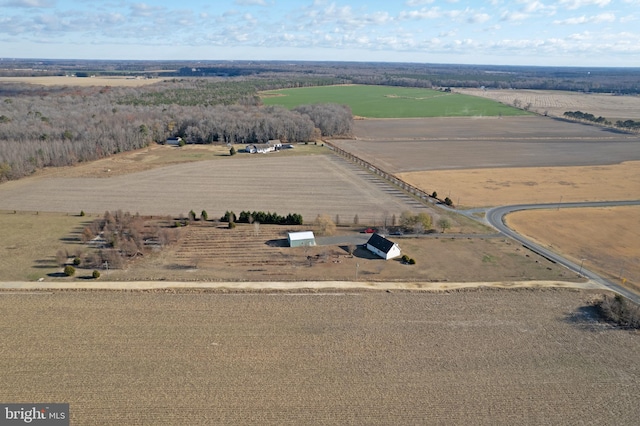 birds eye view of property with a rural view