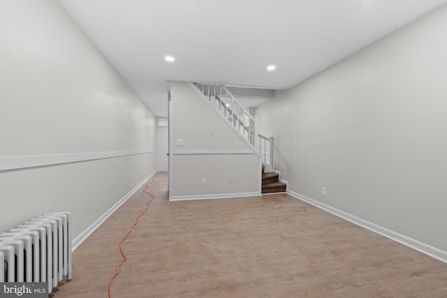 basement with radiator heating unit