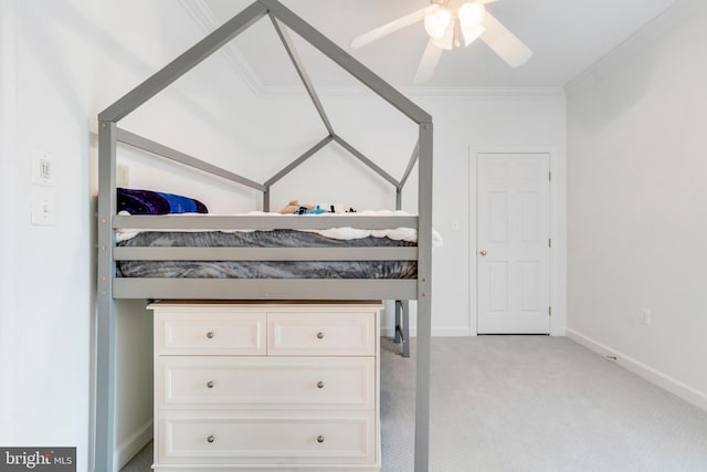 bedroom with ceiling fan, light colored carpet, and ornamental molding