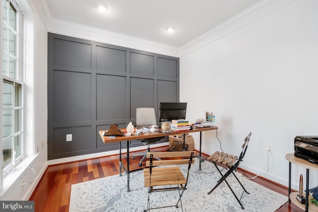 office area featuring crown molding and dark hardwood / wood-style flooring